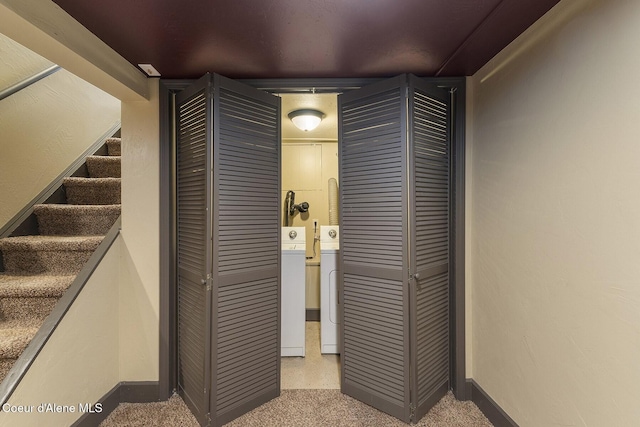 interior space with washing machine and dryer