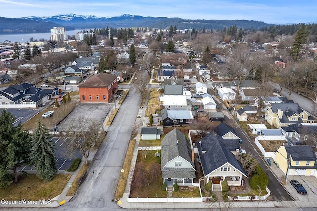 aerial view with a residential view and a water and mountain view