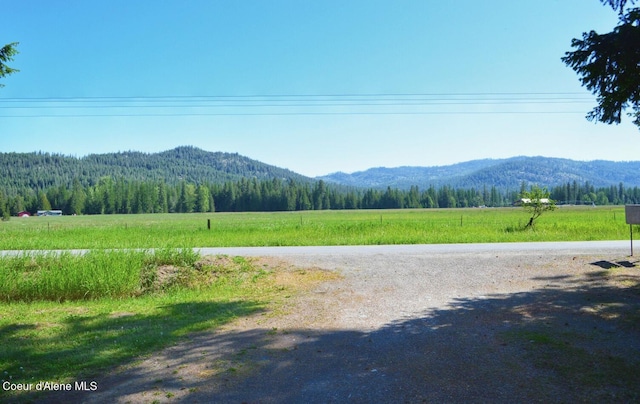 mountain view featuring a wooded view