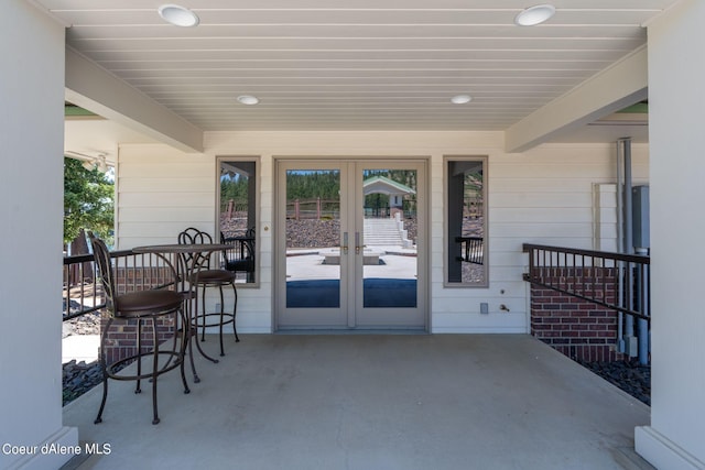 doorway to property with french doors and a patio area