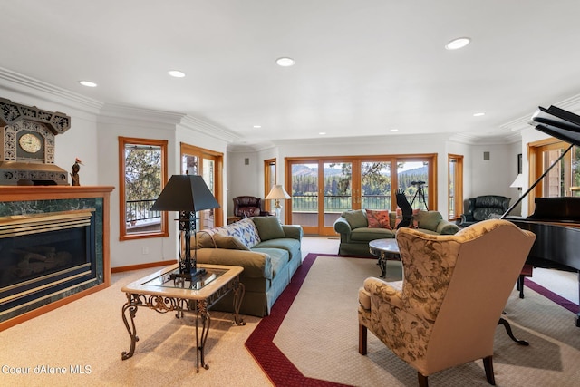 living area with a premium fireplace, carpet, a wealth of natural light, and recessed lighting