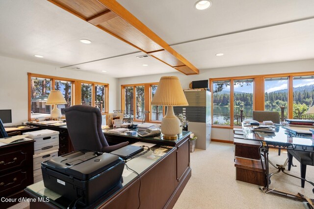 office area with recessed lighting, a healthy amount of sunlight, and visible vents