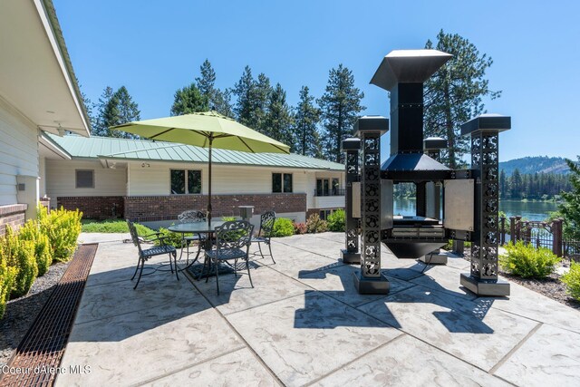 view of patio featuring outdoor dining space