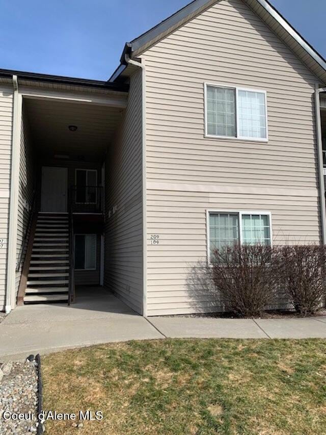 rear view of house with stairway