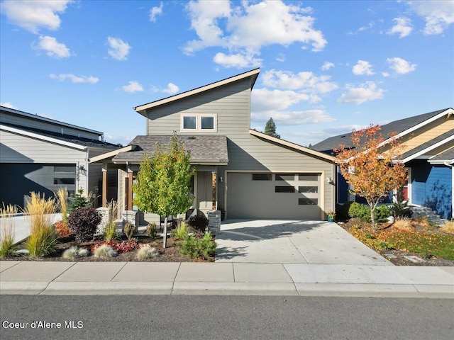 3299 N Rosalia Rd, Coeur Dalene, ID 83814 - view of front of home with a garage, roof with shingles, and driveway