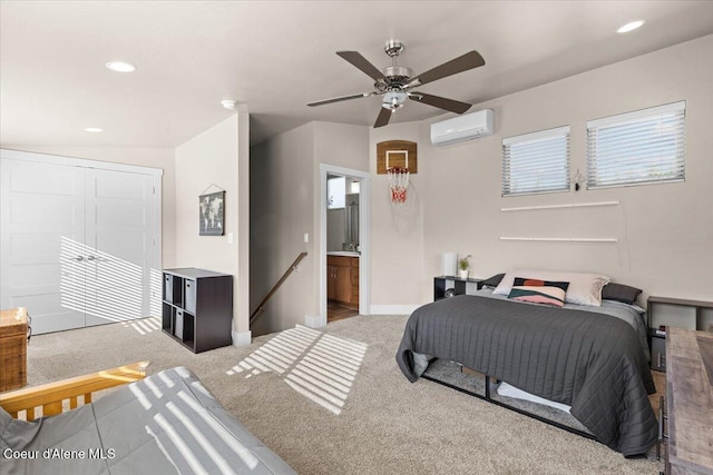 carpeted bedroom featuring recessed lighting, a wall unit AC, ceiling fan, and baseboards