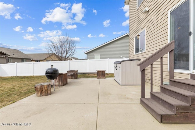 view of patio / terrace featuring entry steps and fence