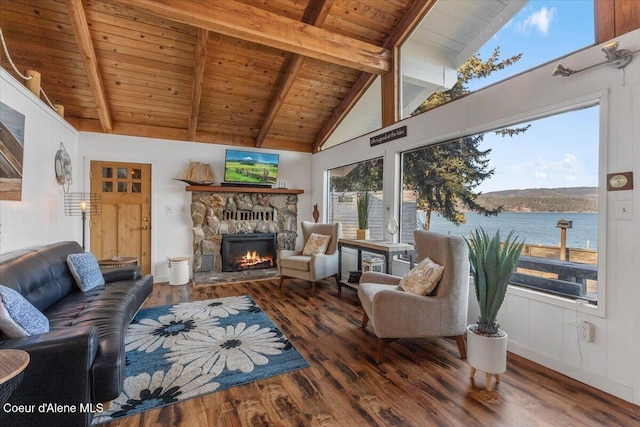 living room featuring beam ceiling, a stone fireplace, wood finished floors, high vaulted ceiling, and wooden ceiling