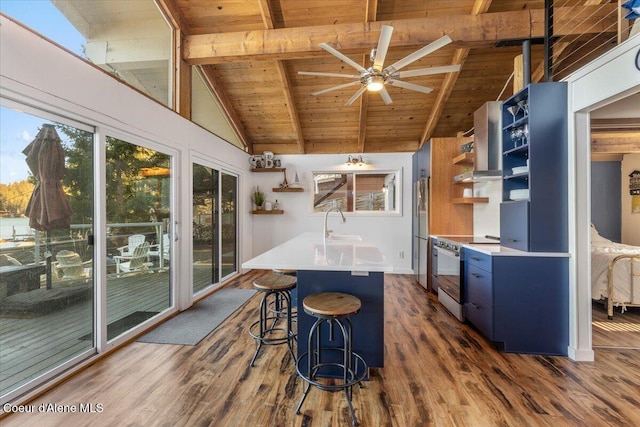 kitchen with range with electric cooktop, dark wood-style floors, beamed ceiling, freestanding refrigerator, and open shelves