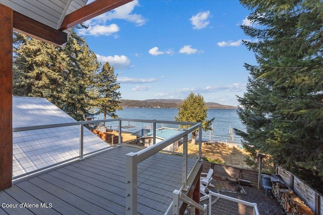 wooden terrace with a water view