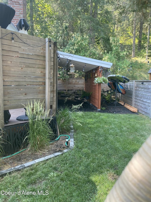 view of yard featuring fence