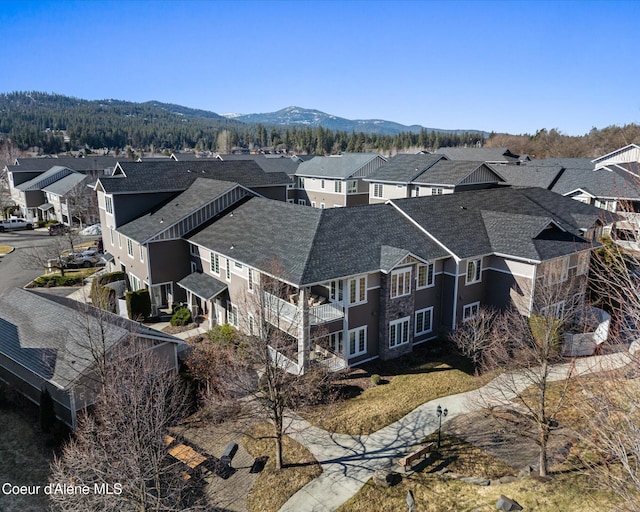 bird's eye view with a residential view and a mountain view