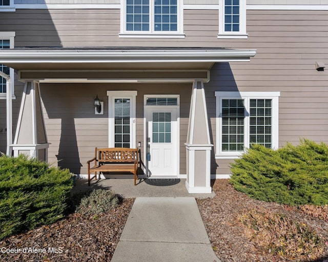 entrance to property with a porch