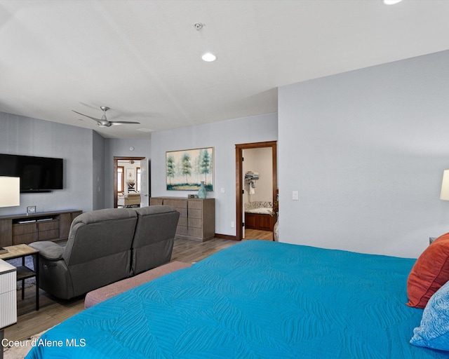 bedroom with recessed lighting, connected bathroom, ceiling fan, wood finished floors, and baseboards