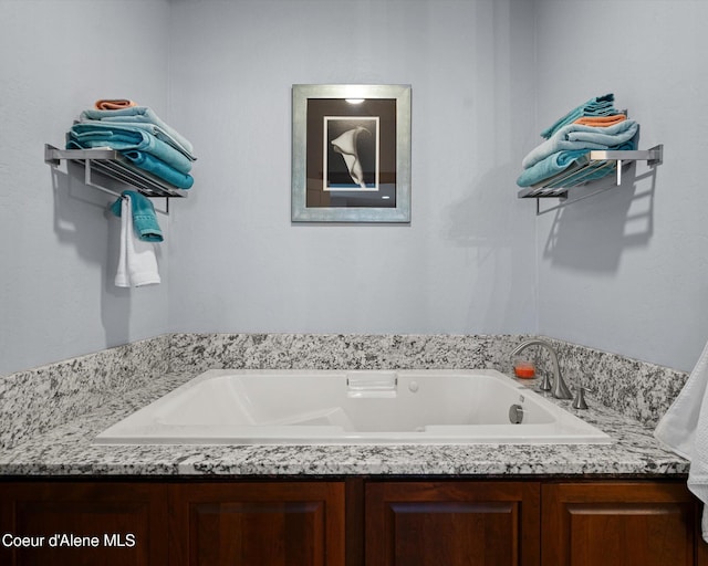 full bathroom featuring a garden tub