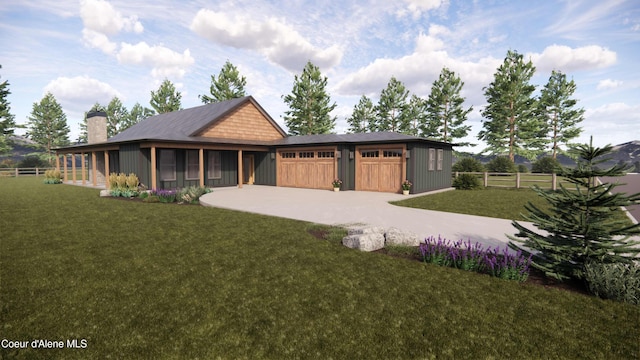 view of front facade with a garage, driveway, a front lawn, and fence