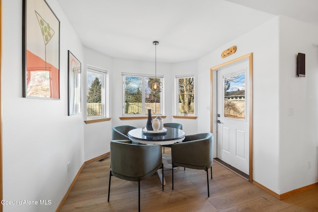 2645 W Bolivar Ave, Coeur Dalene, ID 83815 - dining room featuring visible vents, baseboards, and wood finished floors
