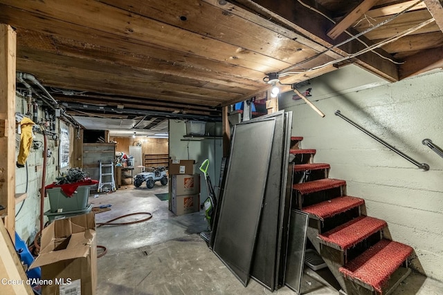 unfinished basement with stairs