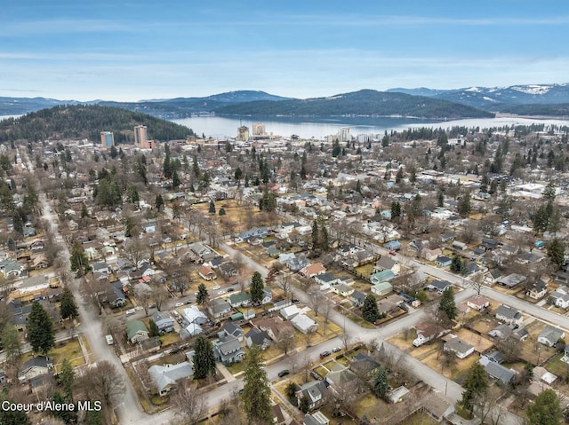 bird's eye view featuring a water and mountain view