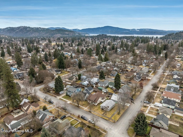 drone / aerial view with a residential view and a mountain view