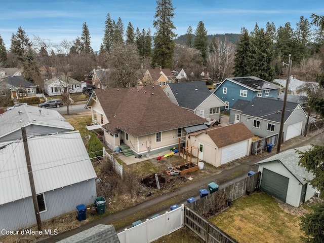 birds eye view of property with a residential view