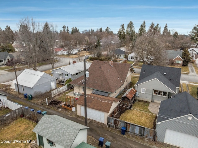 birds eye view of property with a residential view