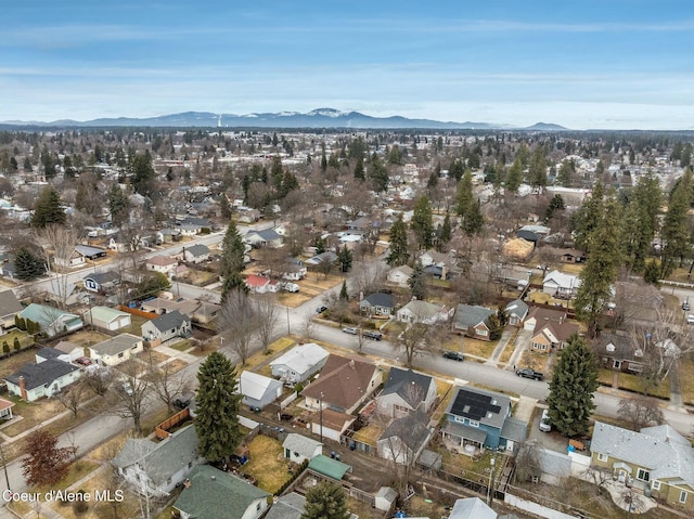 birds eye view of property with a residential view and a mountain view