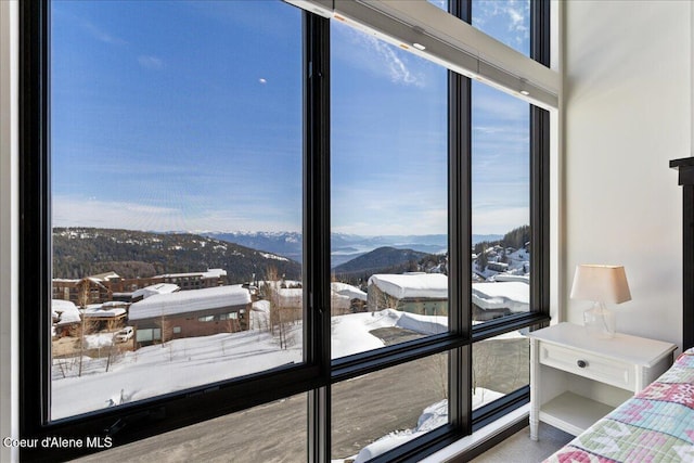 unfurnished bedroom with a mountain view