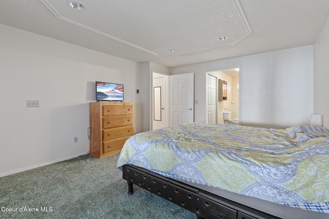 carpeted bedroom with a textured ceiling, connected bathroom, and baseboards