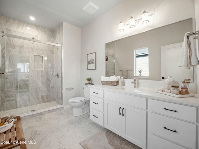 full bath with visible vents, a stall shower, toilet, and vanity