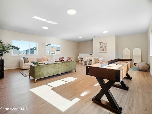 playroom featuring recessed lighting, baseboards, and wood finished floors