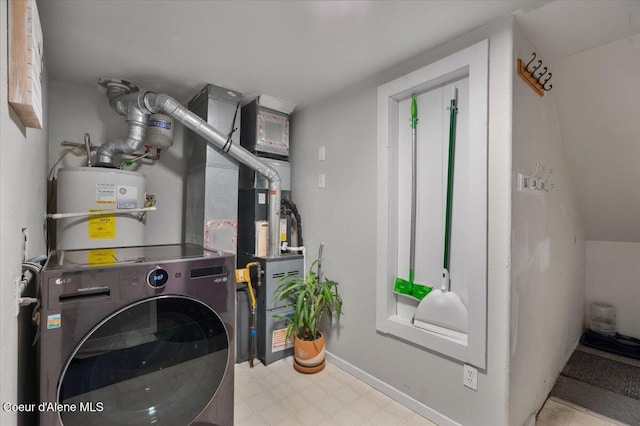 interior space with washer / clothes dryer, water heater, laundry area, baseboards, and tile patterned floors