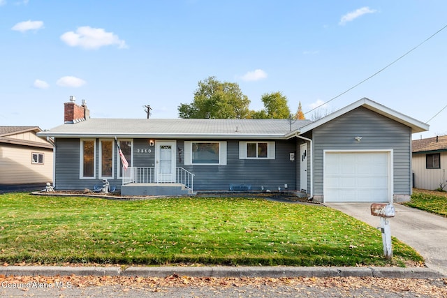 single story home featuring a garage, driveway, a front lawn, and a chimney