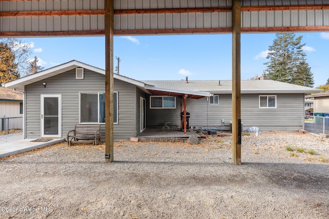 exterior space with fence and a wooden deck