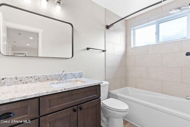 full bath featuring toilet, shower / bath combination, and vanity