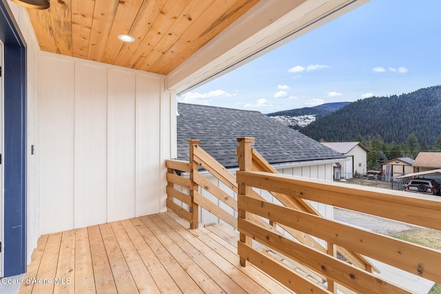 wooden terrace featuring a mountain view