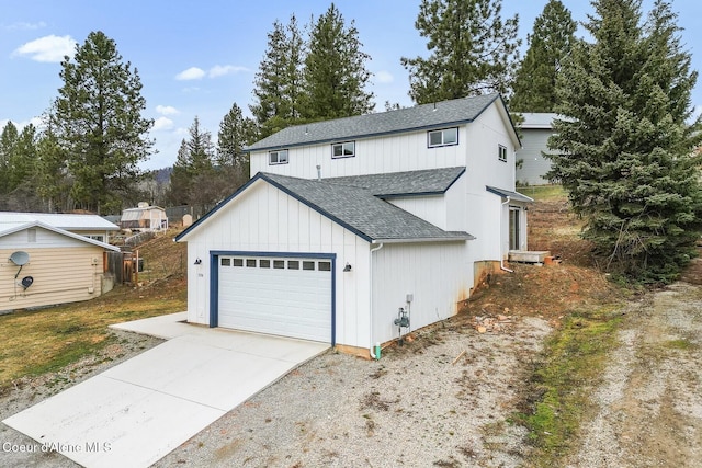 modern farmhouse with a garage, concrete driveway, and roof with shingles