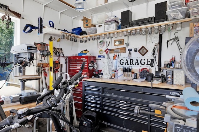 garage featuring a workshop area