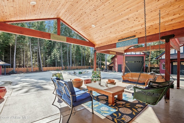 exterior space featuring high vaulted ceiling, expansive windows, and wood ceiling