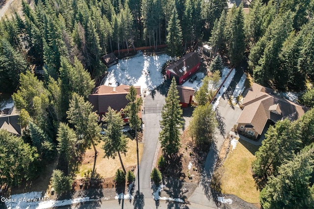 drone / aerial view with a view of trees