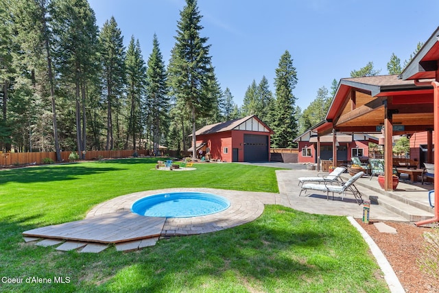 12651 N Yearling Cir, Hayden, ID 83835 - view of pool with an outdoor structure and a patio