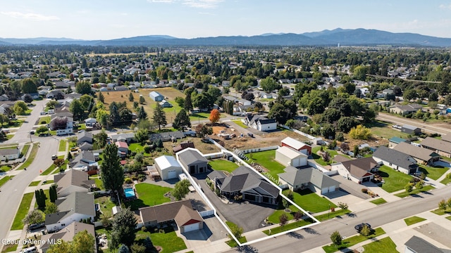 birds eye view of property featuring a residential view and a mountain view