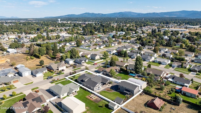 aerial view featuring a mountain view and a residential view