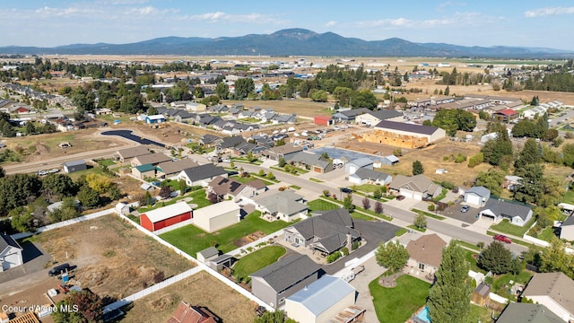 aerial view with a mountain view and a residential view