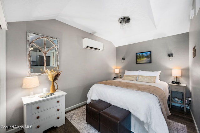 bedroom with baseboards, dark wood finished floors, vaulted ceiling, and a wall unit AC