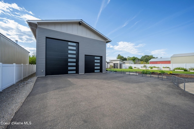 detached garage with fence