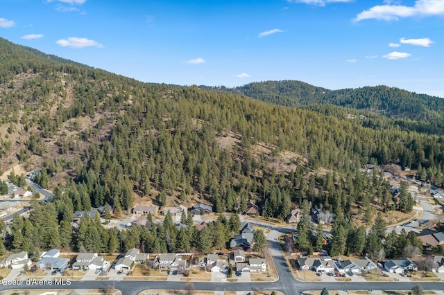 bird's eye view with a mountain view, a forest view, and a residential view