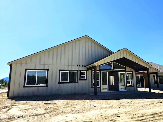 105 Backtrack Rd, Sandpoint, ID 83864 - back of house featuring board and batten siding