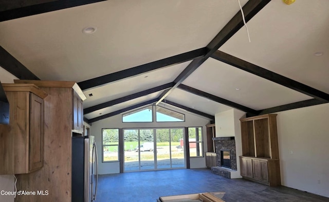 105 Backtrack Rd, Sandpoint, ID 83864 - unfurnished living room featuring a stone fireplace