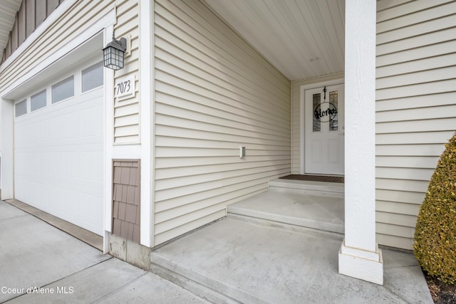 entrance to property with a garage